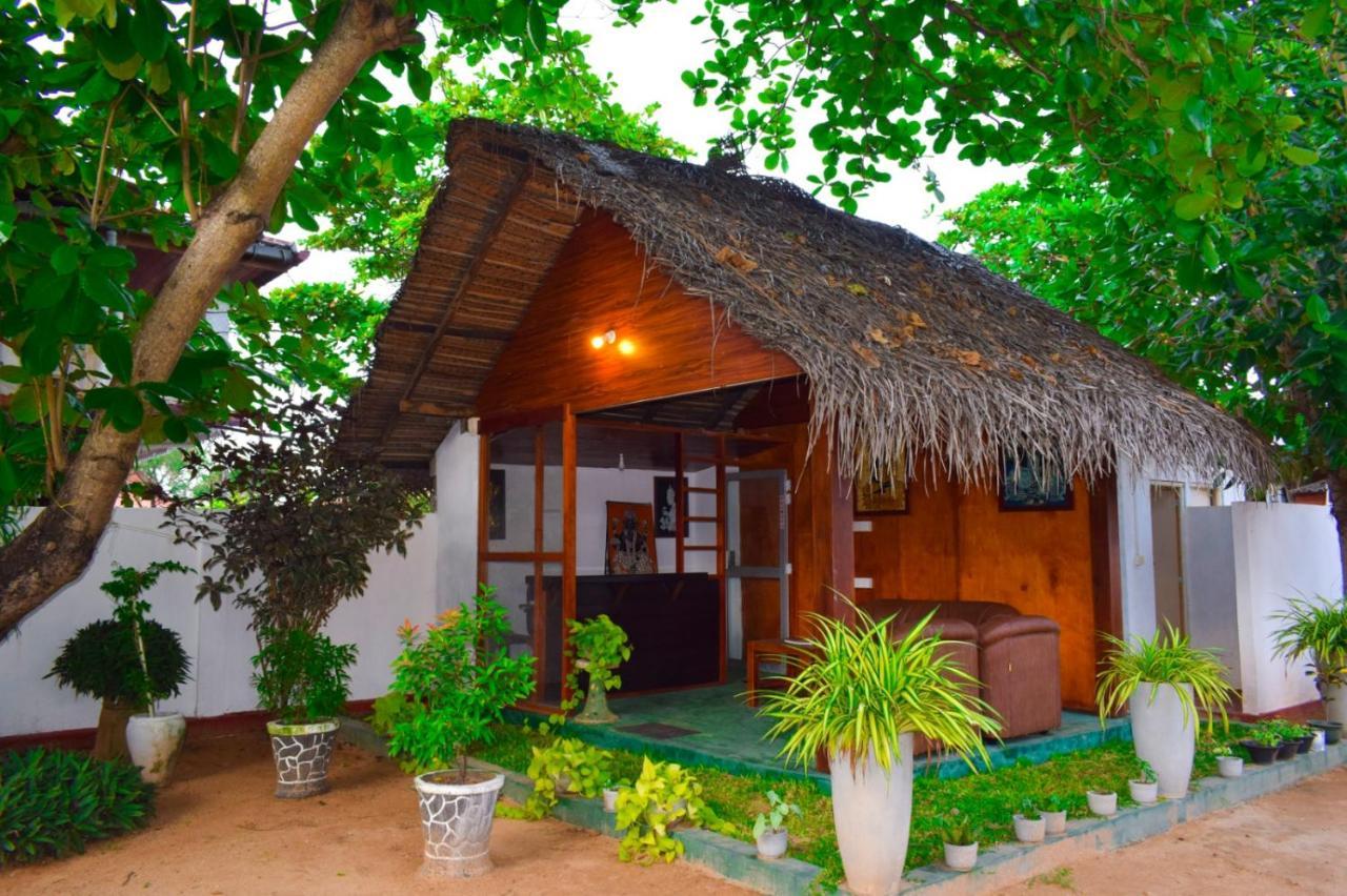 Golden Beach Cottages ตรินโคมาลี ภายนอก รูปภาพ