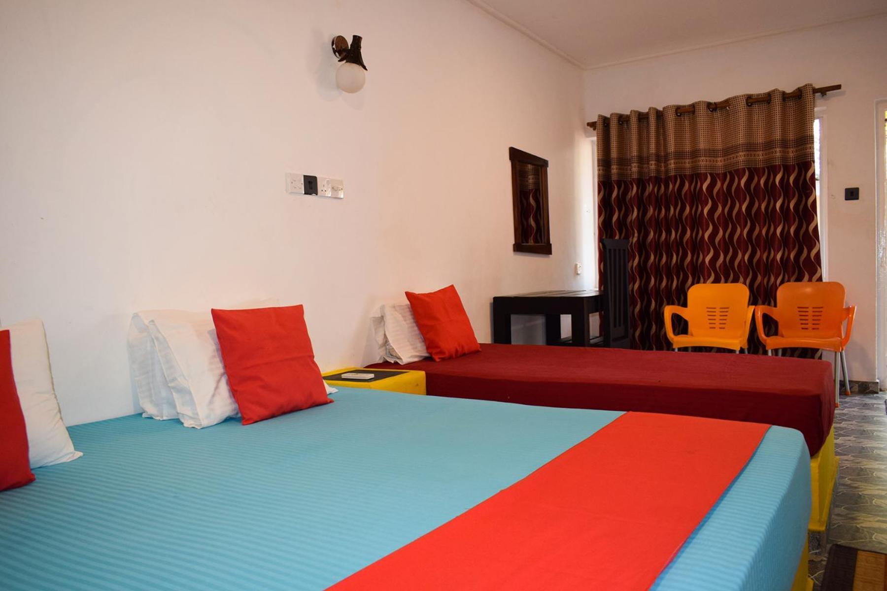 Golden Beach Cottages ตรินโคมาลี ภายนอก รูปภาพ